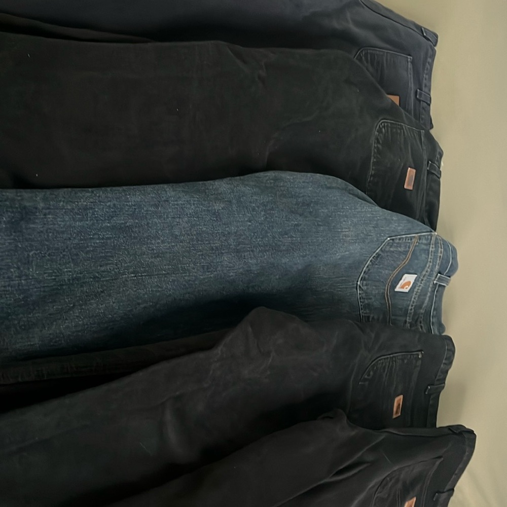 Five pair of carhartt pants size 36 x 30 35 x 30 34 x 30.